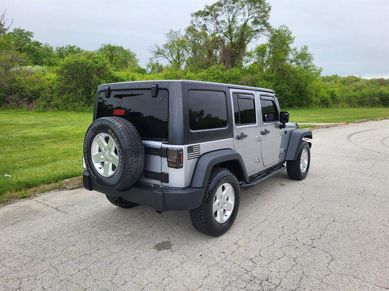 used 2015 Jeep Wrangler Unlimited car, priced at $12,995