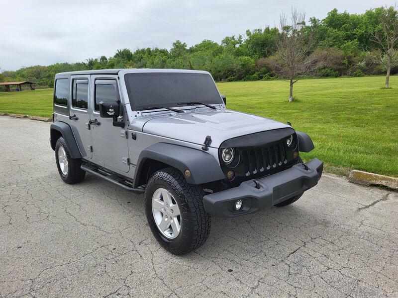 used 2015 Jeep Wrangler Unlimited car, priced at $12,995