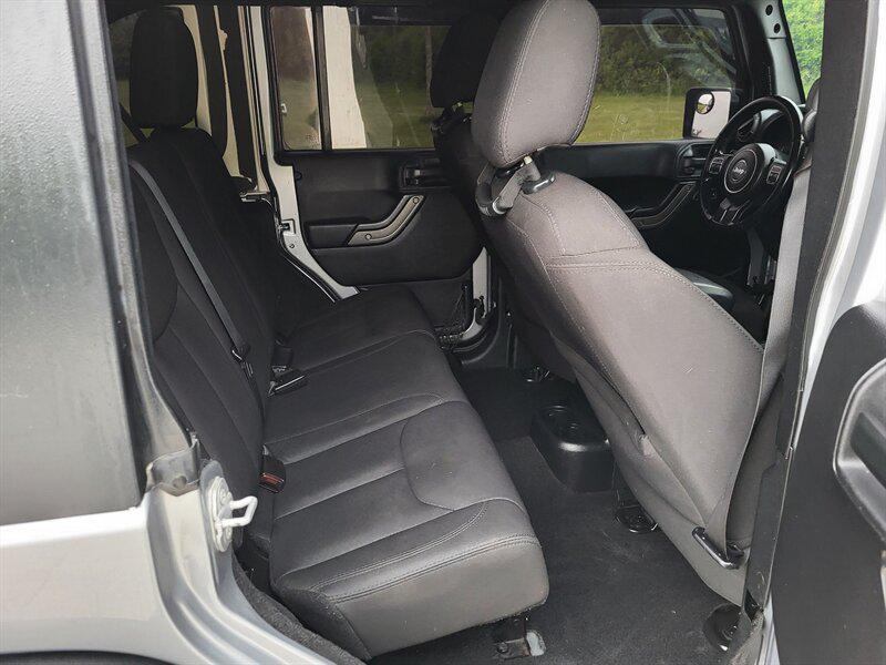 used 2015 Jeep Wrangler Unlimited car, priced at $12,995