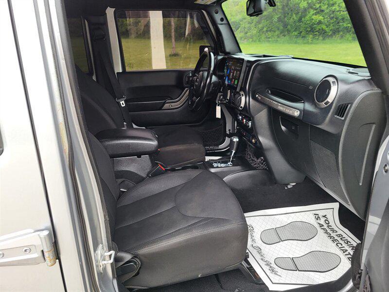 used 2015 Jeep Wrangler Unlimited car, priced at $12,995