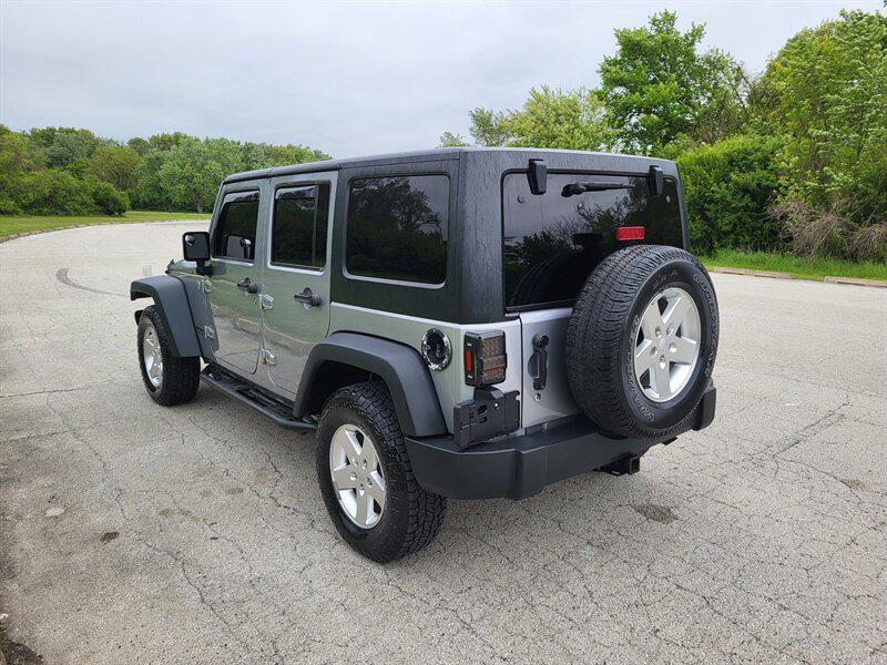 used 2015 Jeep Wrangler Unlimited car, priced at $12,995