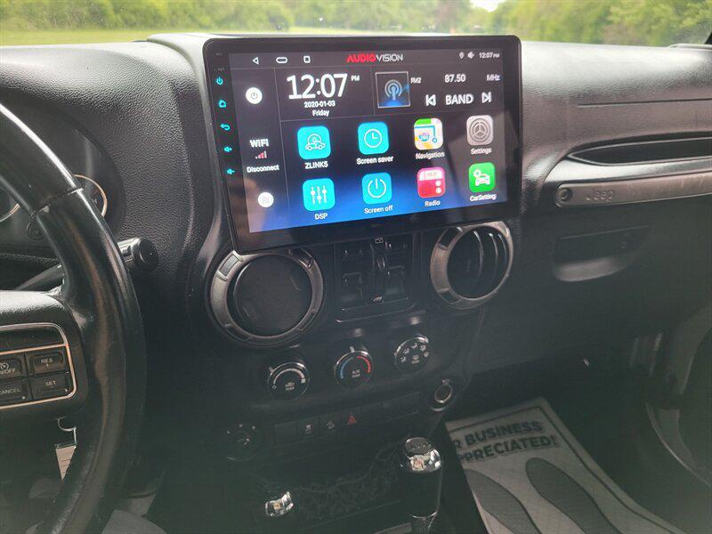 used 2015 Jeep Wrangler Unlimited car, priced at $12,995