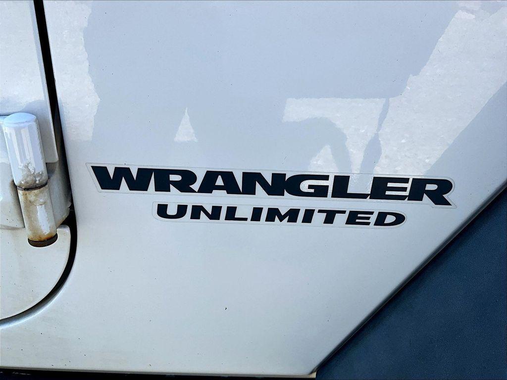 used 2013 Jeep Wrangler Unlimited car, priced at $10,495