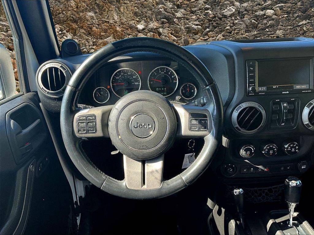 used 2013 Jeep Wrangler Unlimited car, priced at $10,495
