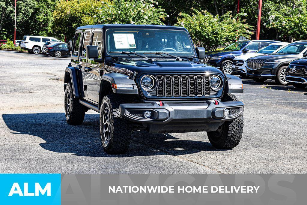 used 2024 Jeep Wrangler car, priced at $37,420
