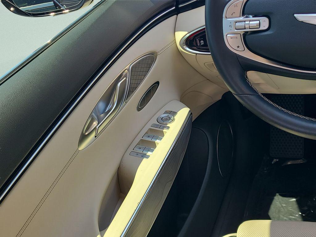 used 2023 Genesis GV70 car, priced at $35,473