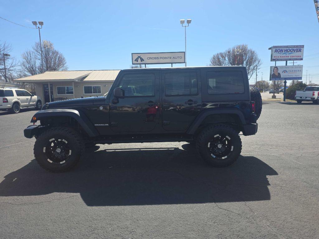 used 2013 Jeep Wrangler Unlimited car, priced at $17,900