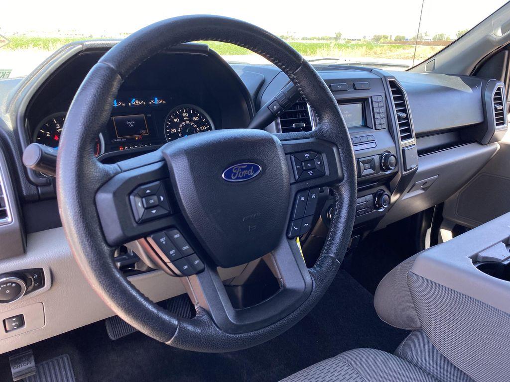 used 2015 Ford F-150 car, priced at $26,406