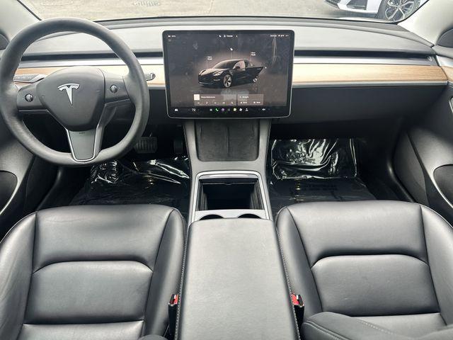 used 2023 Tesla Model 3 car, priced at $27,900