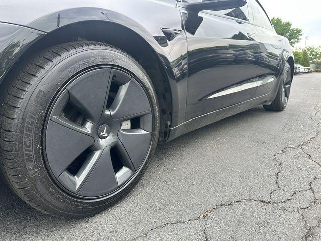 used 2023 Tesla Model 3 car, priced at $27,900