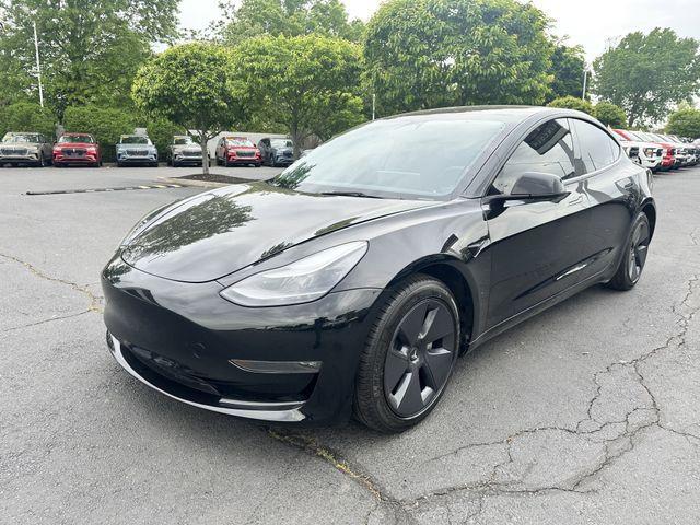 used 2023 Tesla Model 3 car, priced at $27,900