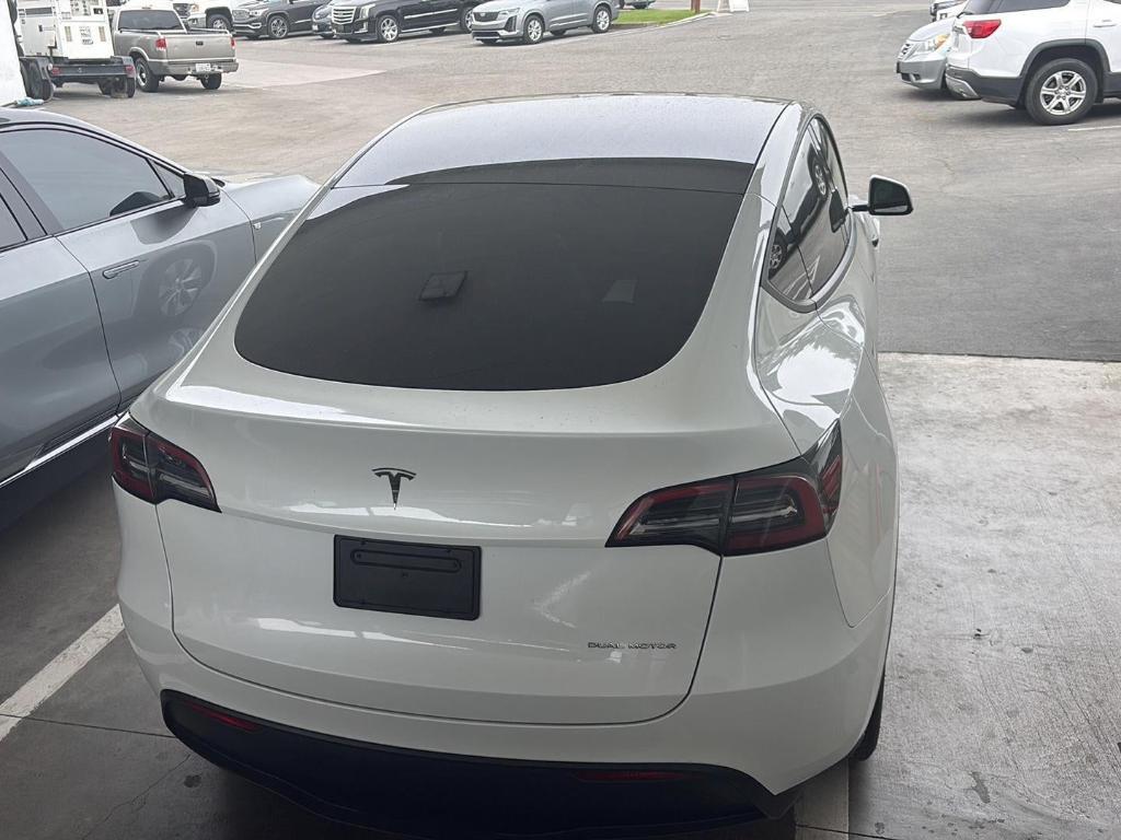 used 2023 Tesla Model Y car, priced at $25,940