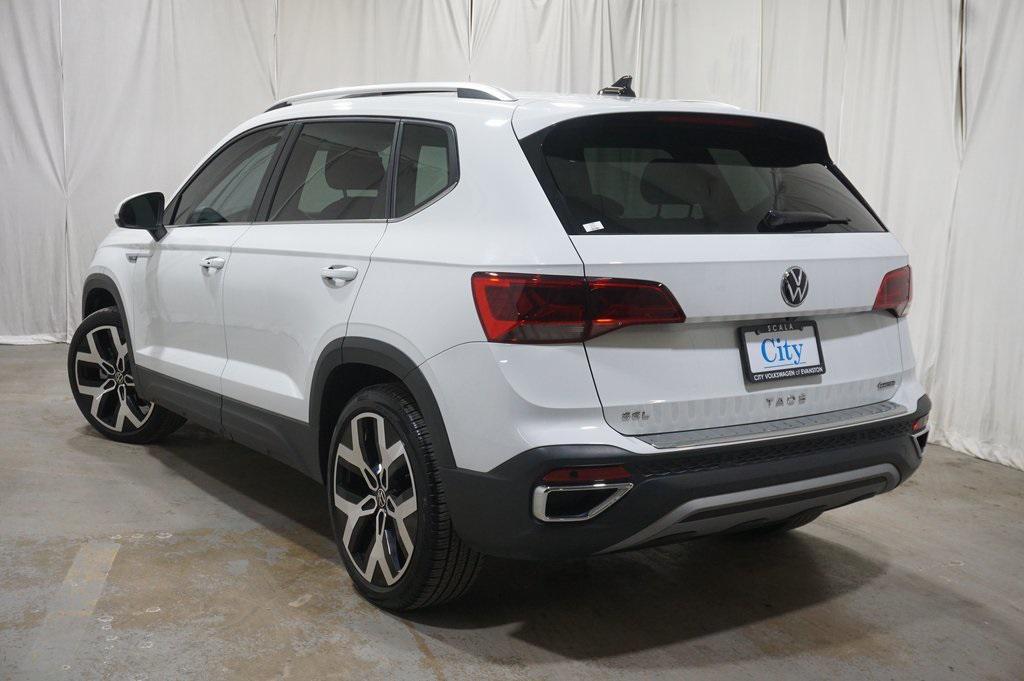 used 2023 Volkswagen Taos car, priced at $23,490