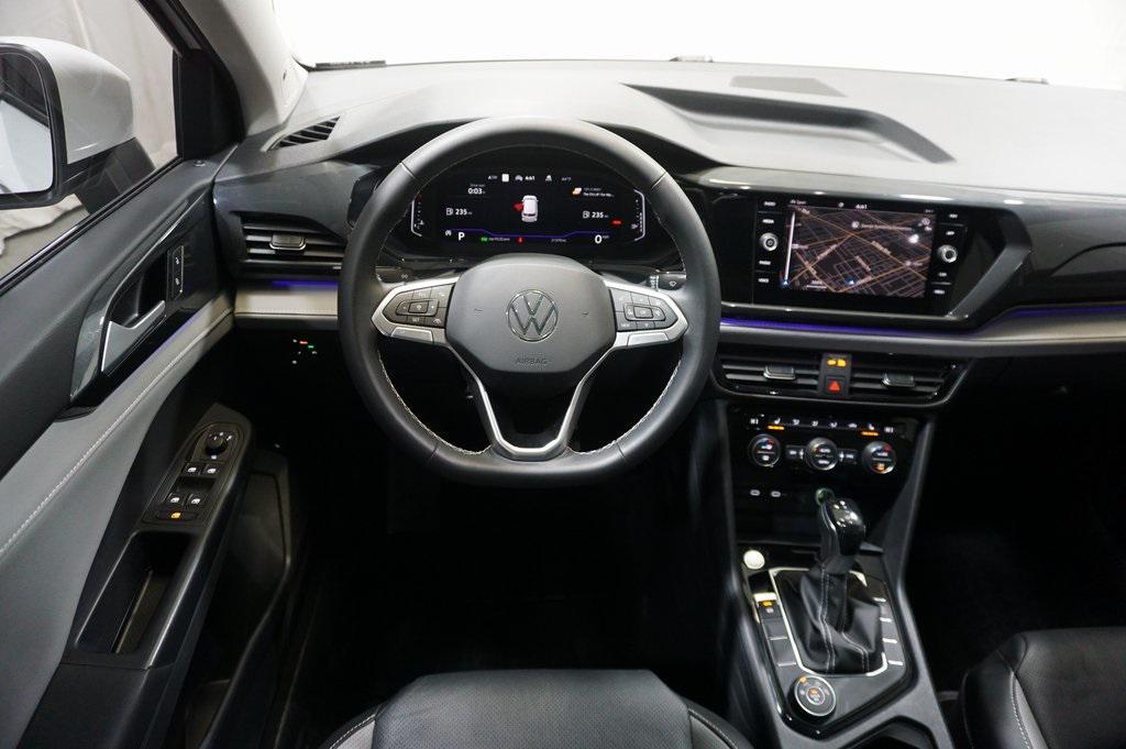 used 2023 Volkswagen Taos car, priced at $23,490