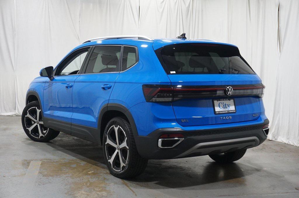 used 2025 Volkswagen Taos car, priced at $27,400