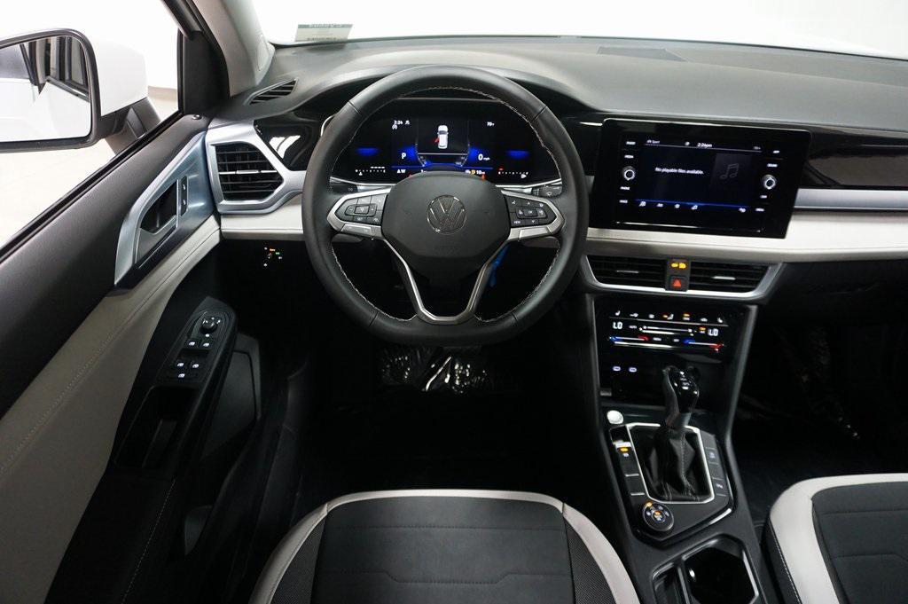 new 2025 Volkswagen Taos car, priced at $27,074