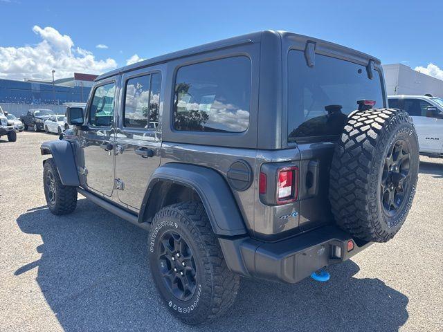 used 2023 Jeep Wrangler 4xe car, priced at $23,600