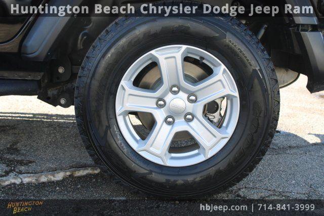 used 2021 Jeep Wrangler Unlimited car, priced at $19,571