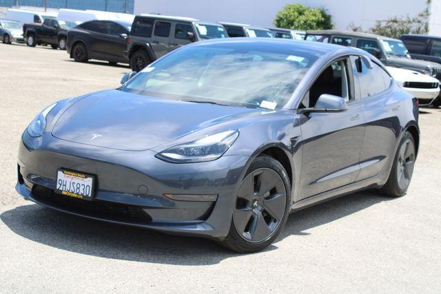 used 2023 Tesla Model 3 car, priced at $26,762