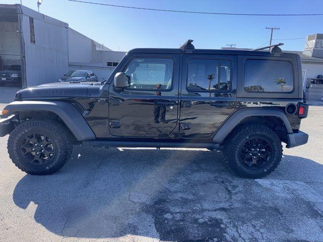 used 2022 Jeep Wrangler Unlimited car, priced at $26,100