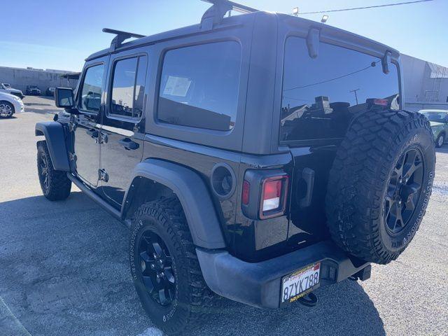 used 2022 Jeep Wrangler Unlimited car, priced at $26,100