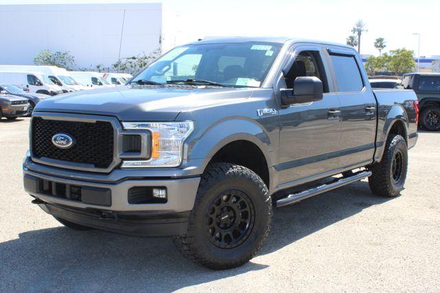 used 2018 Ford F-150 car, priced at $23,990