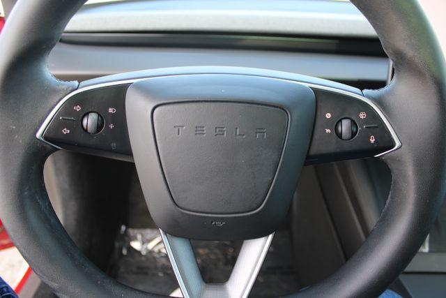 used 2025 Tesla Model 3 car, priced at $34,900