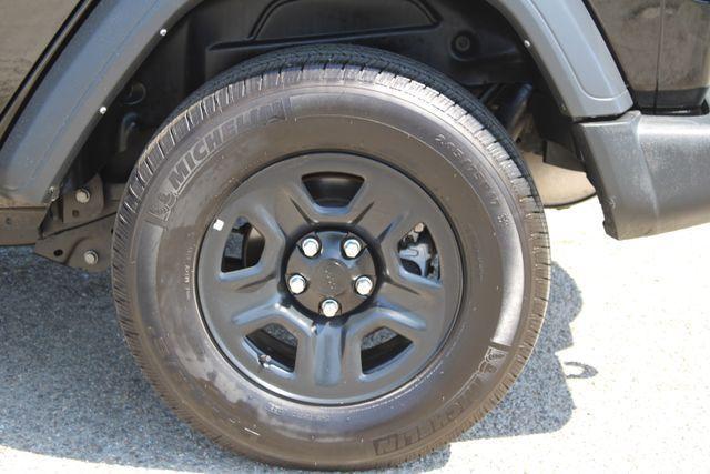 used 2023 Jeep Wrangler car, priced at $19,300