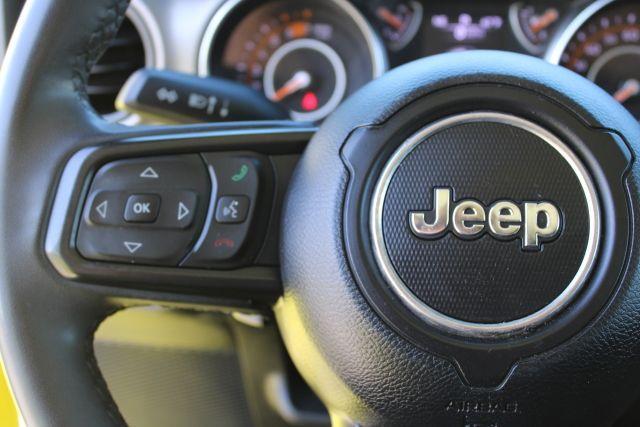 used 2023 Jeep Wrangler car, priced at $20,300