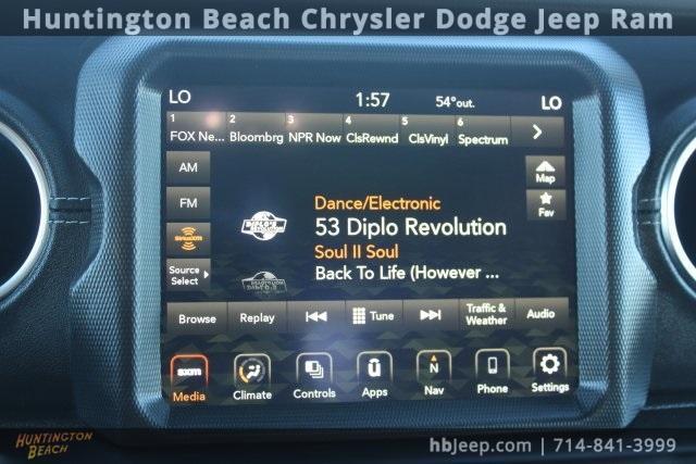 used 2023 Jeep Wrangler 4xe car, priced at $25,027