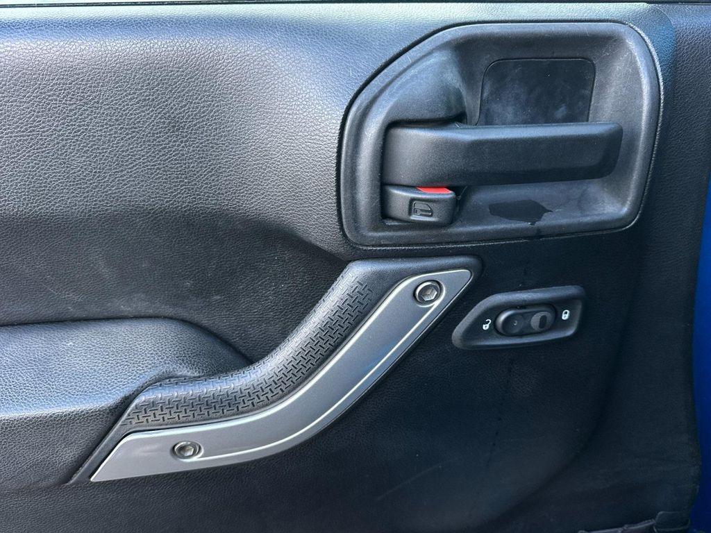 used 2015 Jeep Wrangler Unlimited car, priced at $15,290