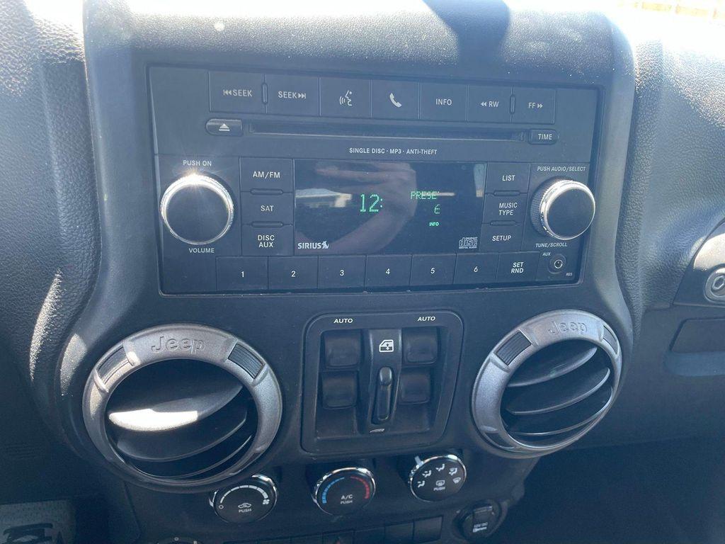 used 2012 Jeep Wrangler Unlimited car, priced at $14,949