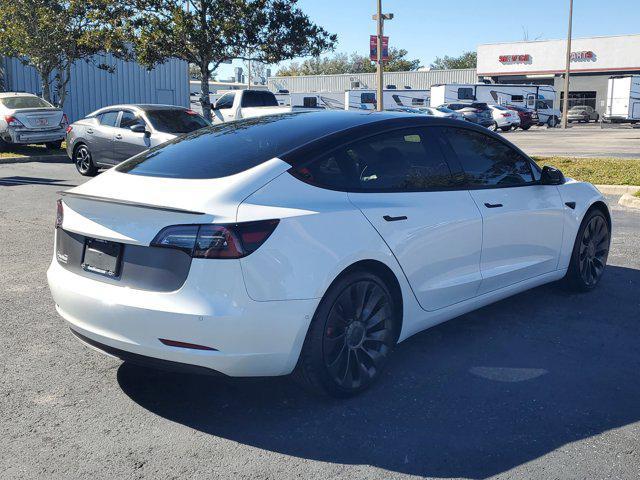 used 2022 Tesla Model 3 car, priced at $25,049