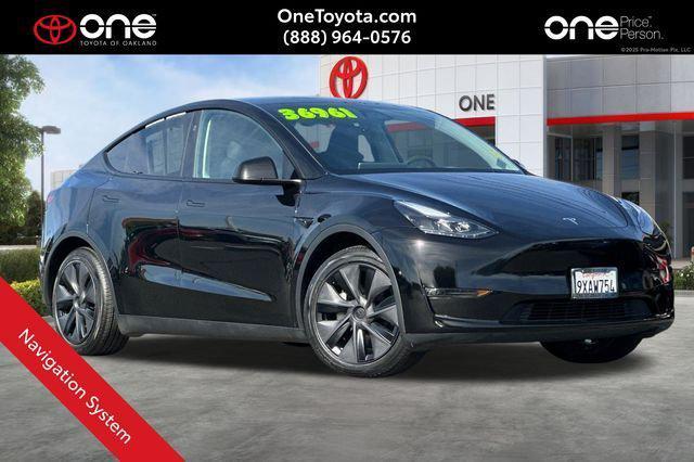 used 2025 Tesla Model Y car, priced at $36,961