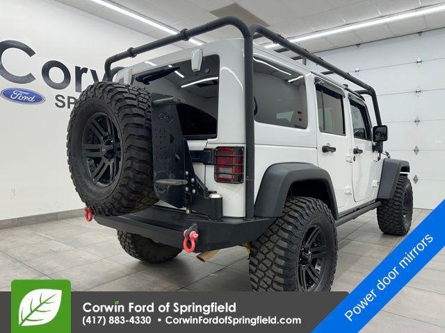 used 2015 Jeep Wrangler Unlimited car, priced at $20,365
