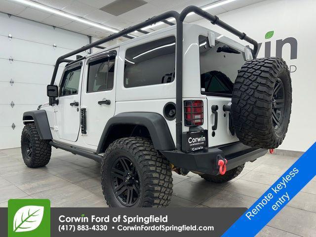 used 2015 Jeep Wrangler Unlimited car, priced at $20,365