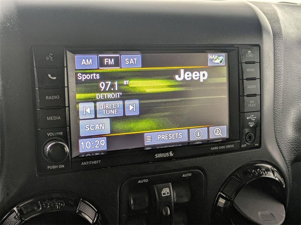 used 2015 Jeep Wrangler Unlimited car, priced at $17,095