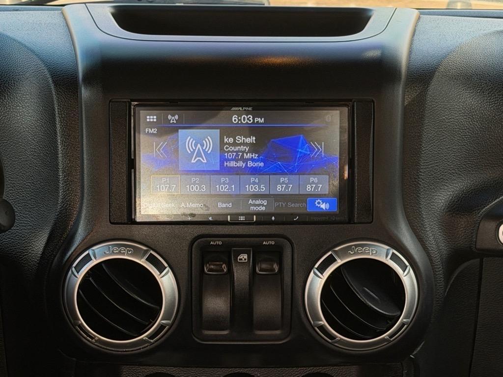 used 2015 Jeep Wrangler car, priced at $17,479