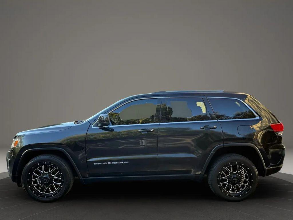 used 2015 Jeep Grand Cherokee car, priced at $9,999