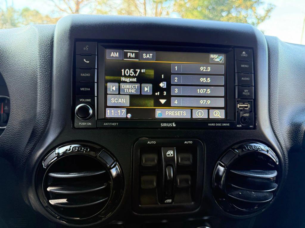 used 2015 Jeep Wrangler Unlimited car, priced at $13,499