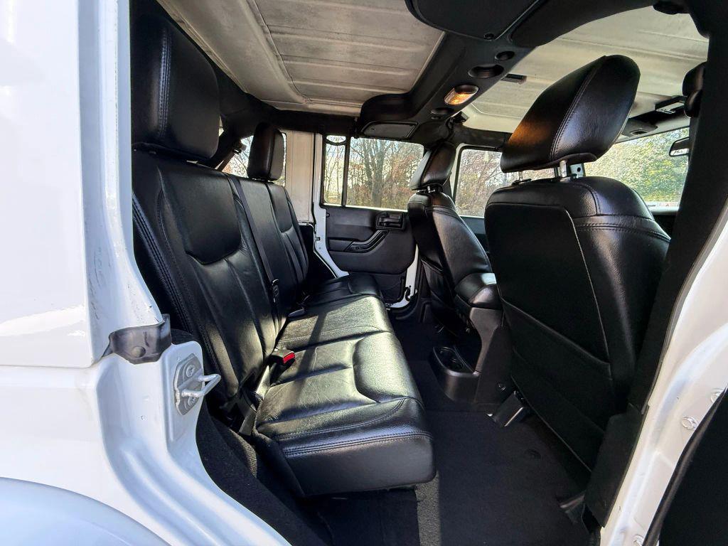 used 2015 Jeep Wrangler Unlimited car, priced at $13,499