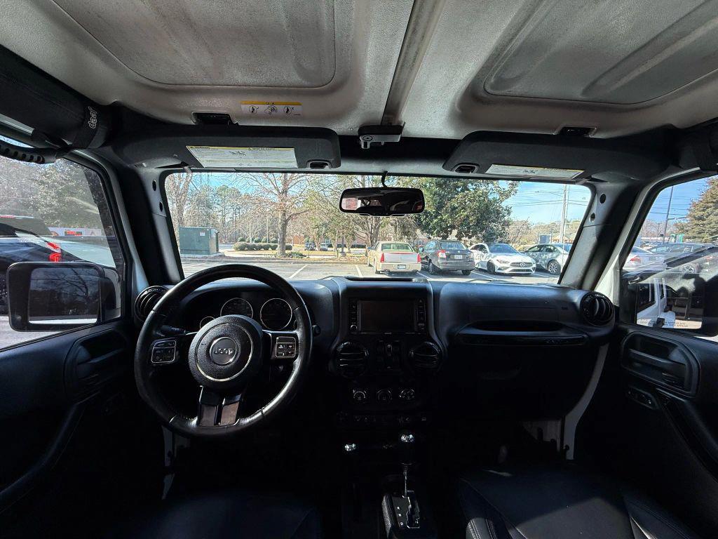 used 2015 Jeep Wrangler Unlimited car, priced at $13,499