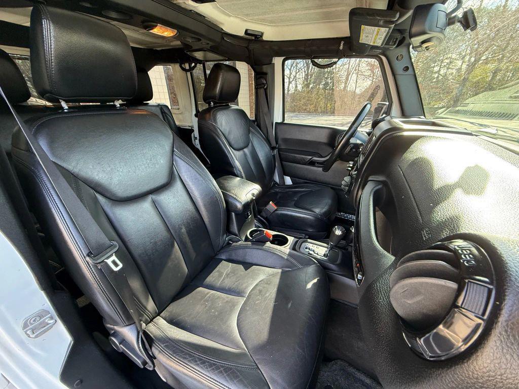 used 2015 Jeep Wrangler Unlimited car, priced at $13,499