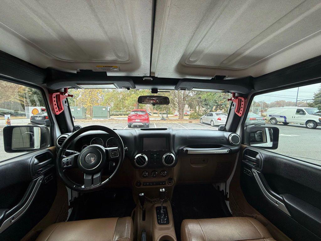 used 2012 Jeep Wrangler Unlimited car, priced at $13,499