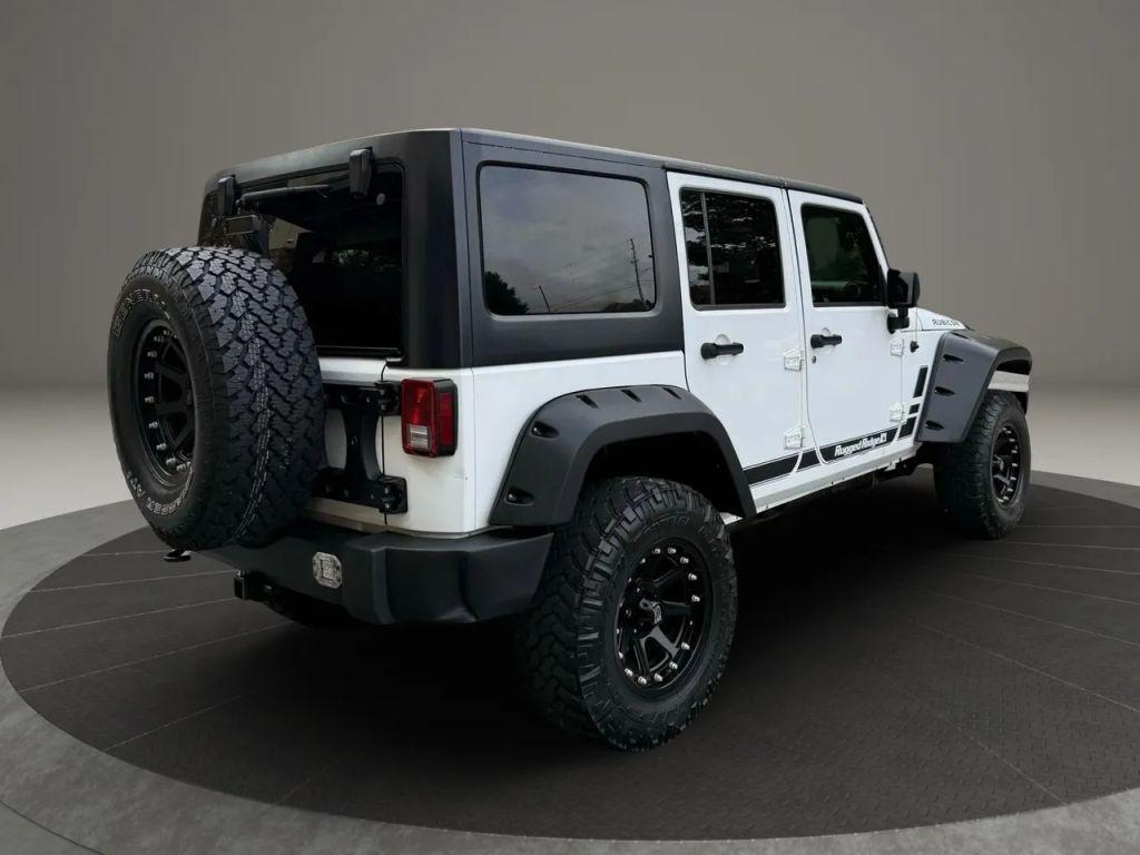 used 2012 Jeep Wrangler Unlimited car, priced at $13,499