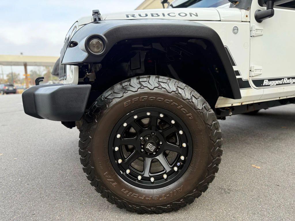 used 2012 Jeep Wrangler Unlimited car, priced at $13,499