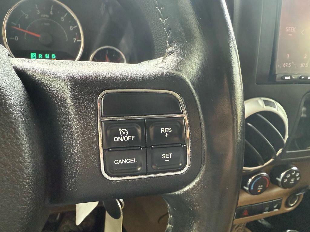 used 2012 Jeep Wrangler Unlimited car, priced at $13,499