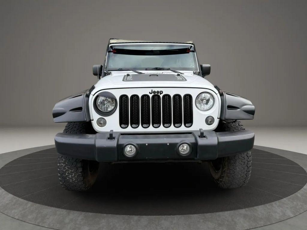 used 2012 Jeep Wrangler Unlimited car, priced at $13,499