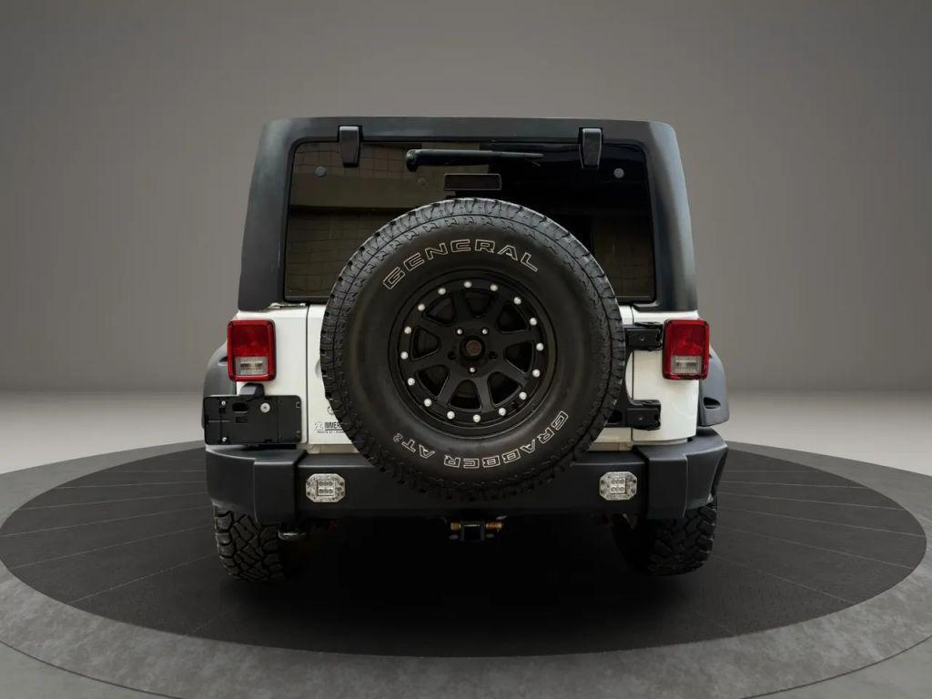 used 2012 Jeep Wrangler Unlimited car, priced at $13,499