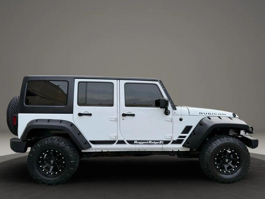 used 2012 Jeep Wrangler Unlimited car, priced at $13,499